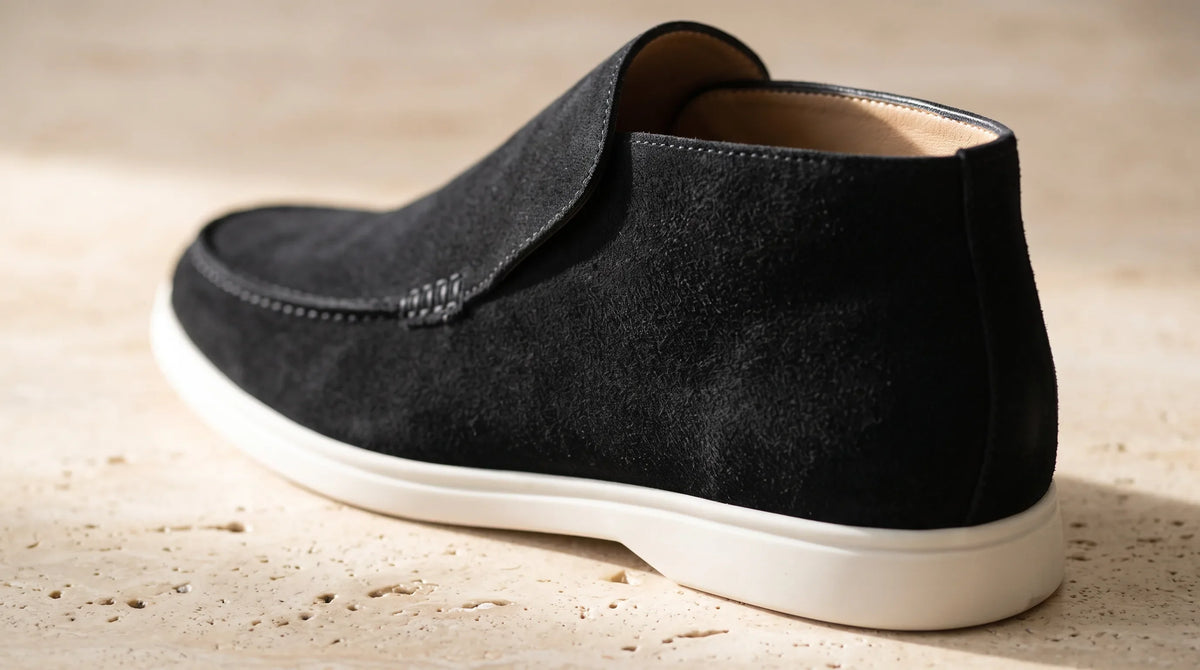 Close-up of the Amalfi Black Loafers' high collar and white sole