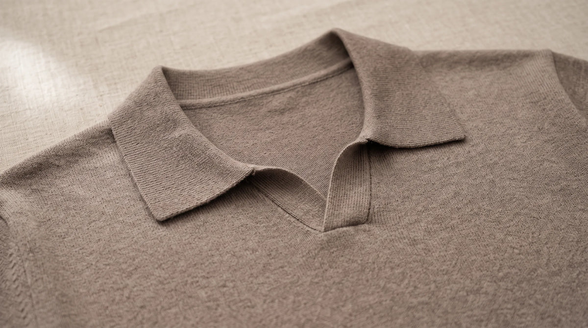 Close-up of the Bellagio Knit Polo's open notch collar