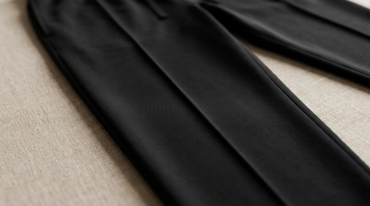 Close-up of the Black Drawstring Yacht Trousers' pressed leg line