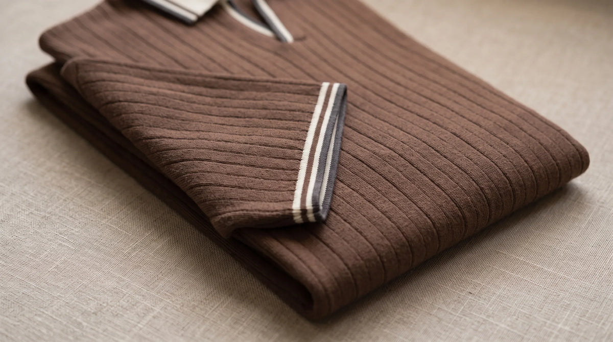 Close-up of the Bonassola Knit Polo's striped cuff tipping