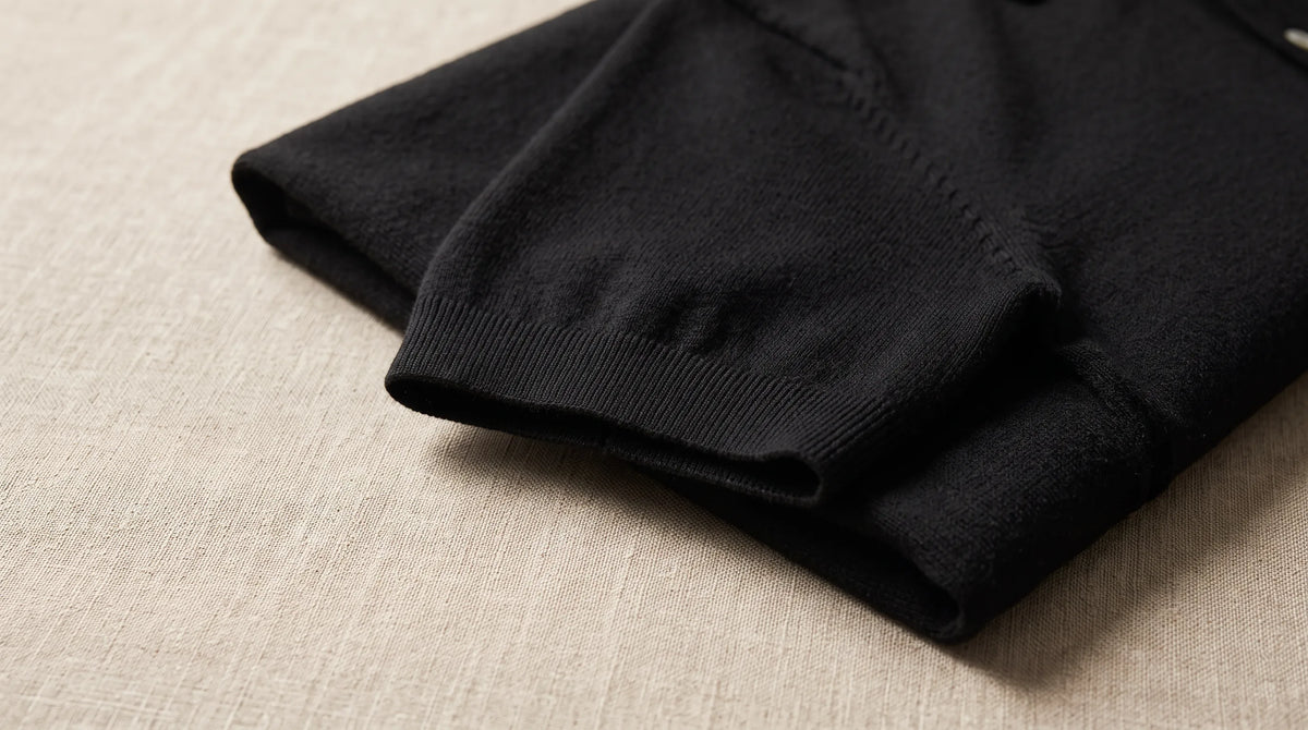 Close-up of the Capri Polo's sleeve and fine smooth knit