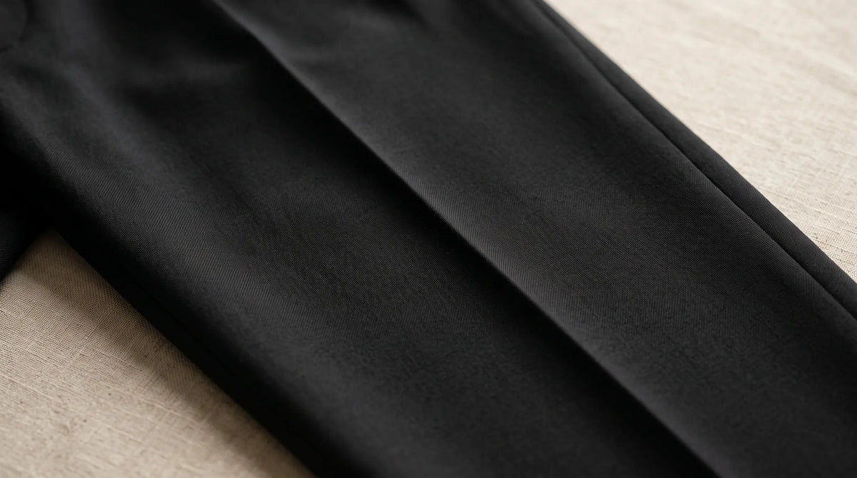 Close-up of the Cinque Terre Pleated Trouser's pressed crease and cloth
