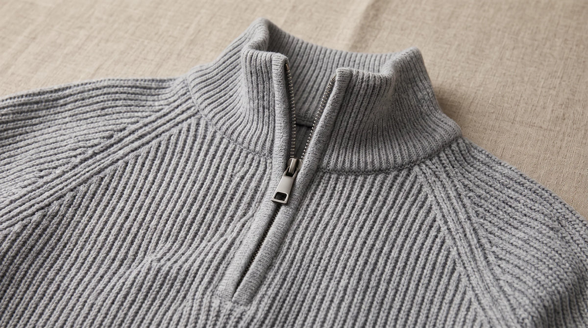 Close-up of the Como Gray Half-Zip Knit's ribbed collar and half zip