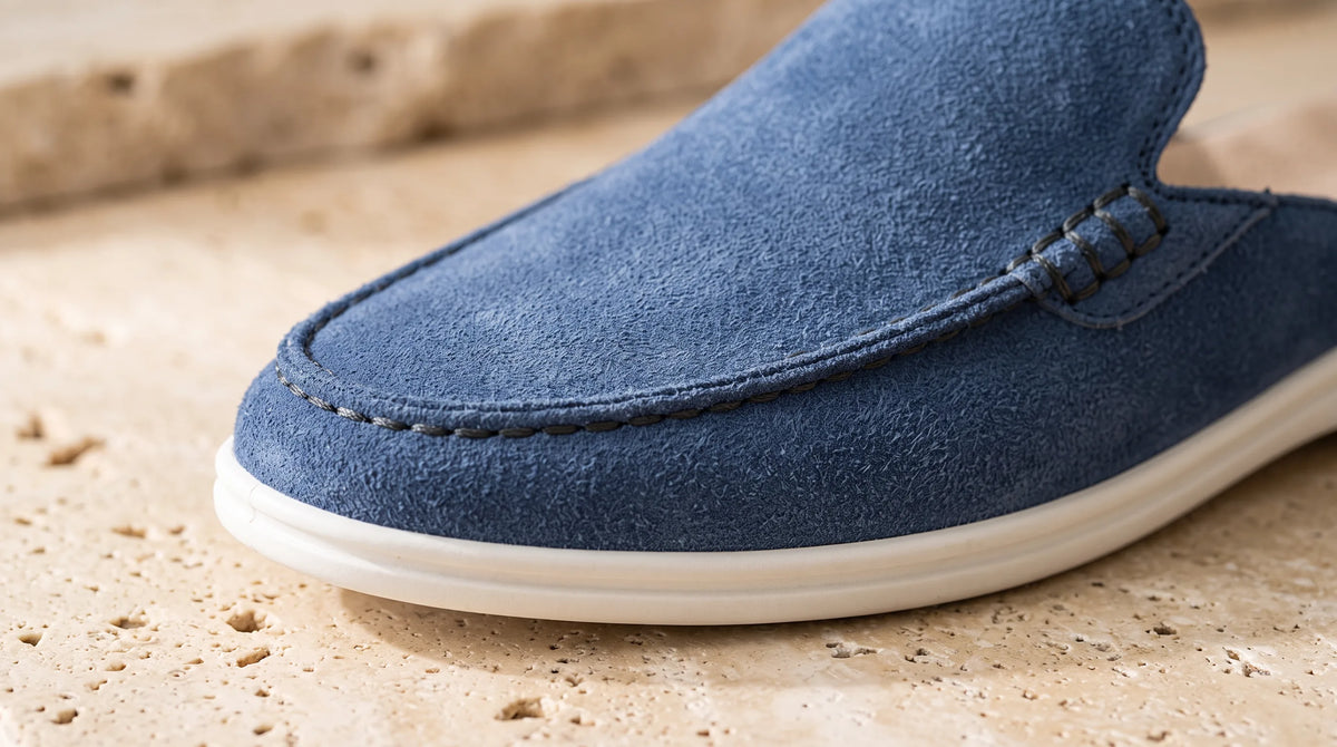 Close-up of the Cove Blue Mule's stitched apron toe