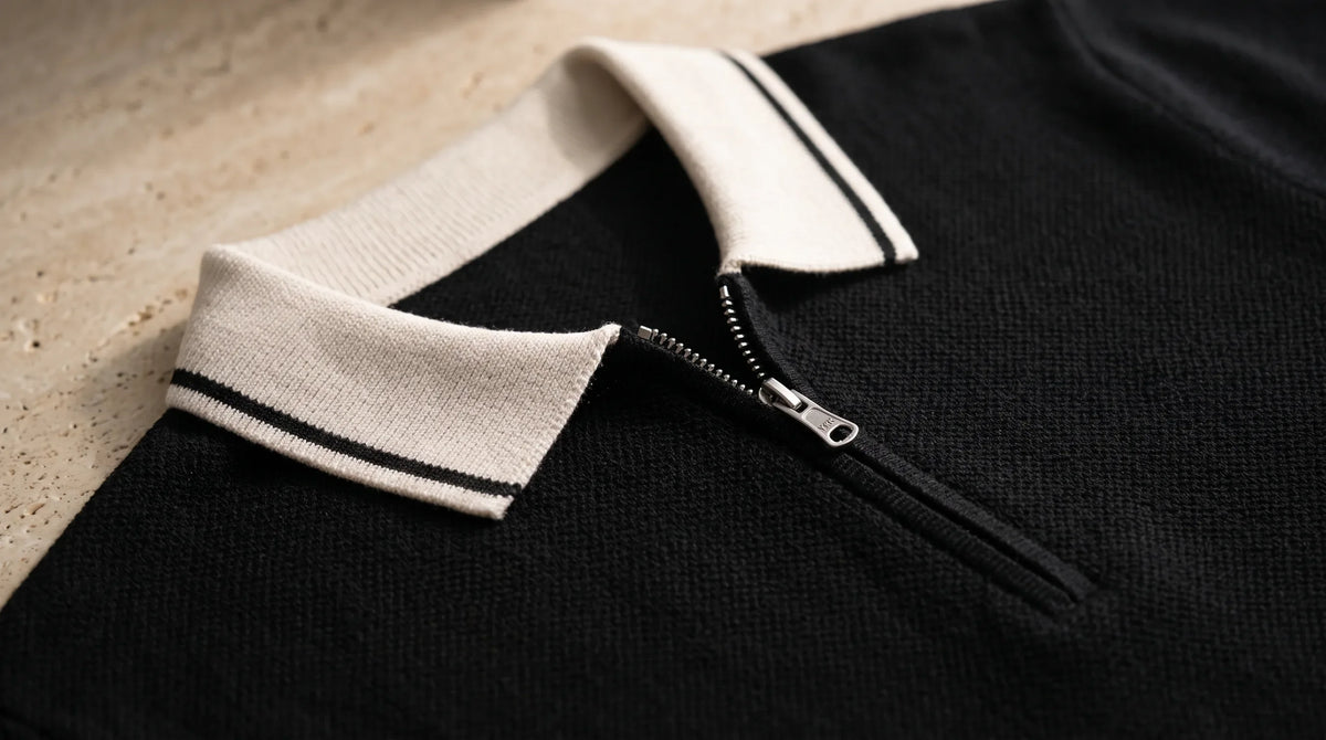 Close-up of the Framura Knit Polo's contrast collar and zip placket