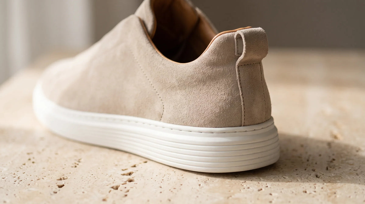 Close-up of the Milano Beige Sneakers' heel and white sole