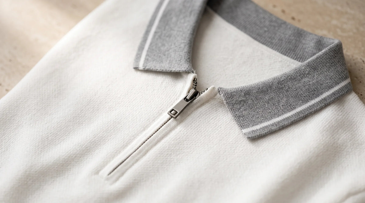 Close-up of the Paraggi Knit Polo's contrast collar and zip placket