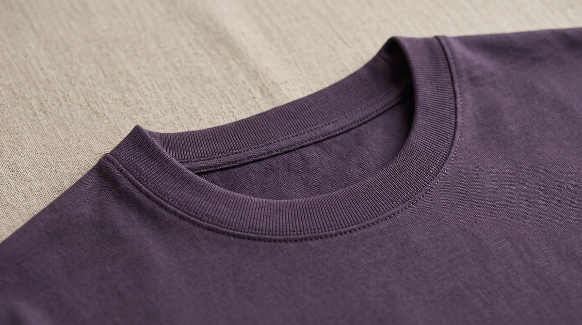 Close-up of the Positano Aubergine Tee's ribbed crew neck