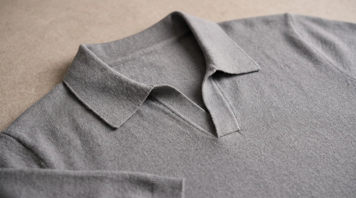 Close-up of the Ravello Knit Polo's open notch collar