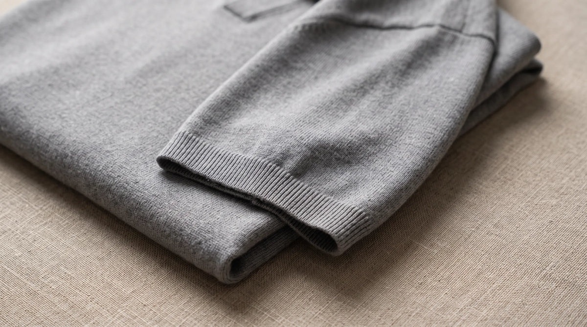 Close-up of the Ravello Knit Polo's ribbed cuff and fine knit