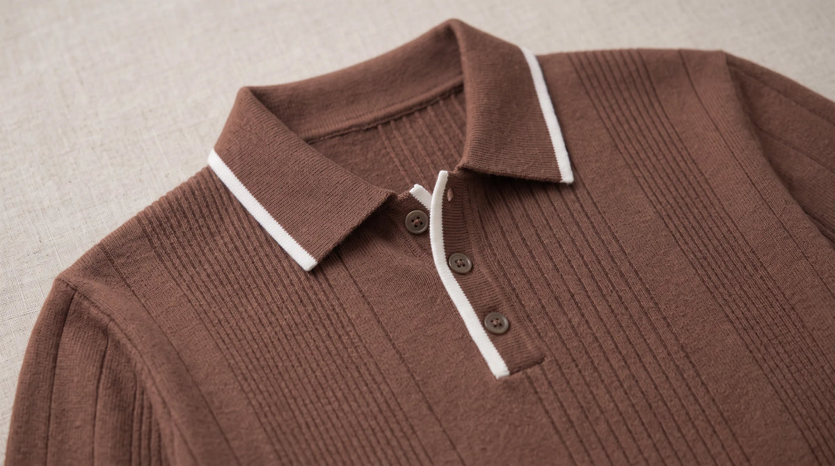 Close-up of the Sarzana Knitted Sweater's white tipped collar and button placket