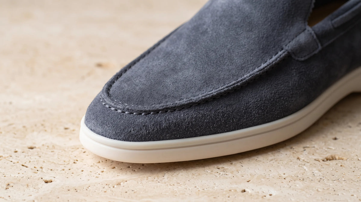 Close-up of the Steel Blue Yacht Loafers' stitched apron toe