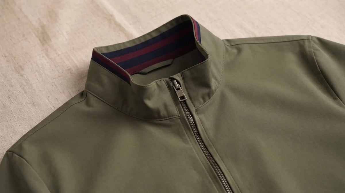 Stand collar and zip of the Camogli Olive jacket