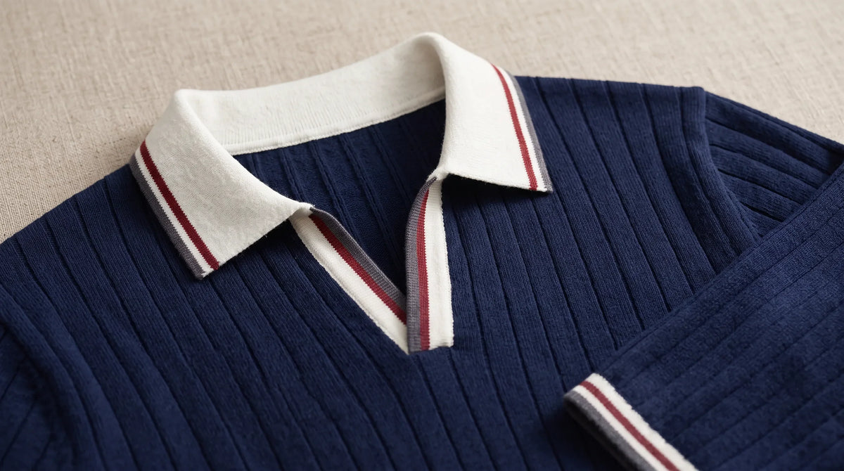 Close-up of the Vernazza Knit Polo's off-white tipped open collar