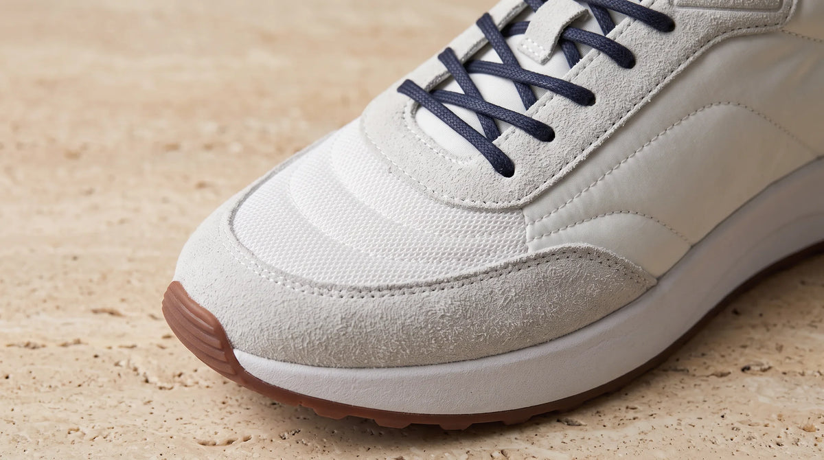 Close-up of the White Portfonio Trainer's suede and mesh upper