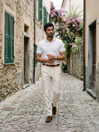 Morino White Polo in a cobblestone village lane