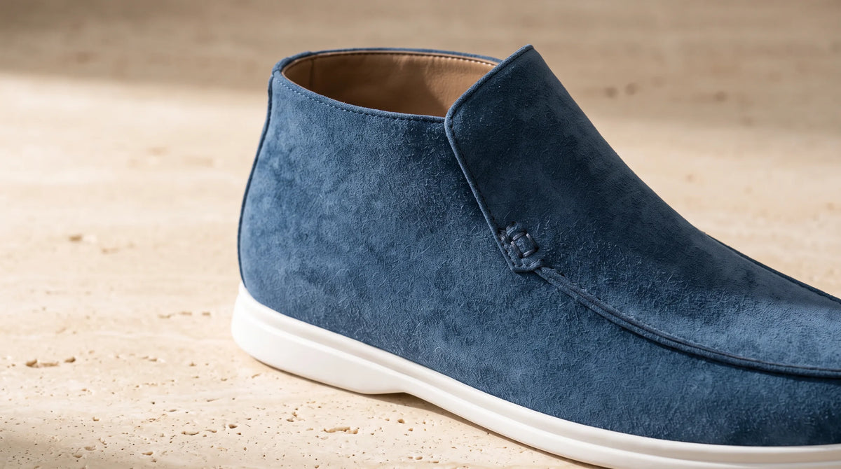 Close-up of the Amalfi Dark Blue Loafers' high collar and white sole