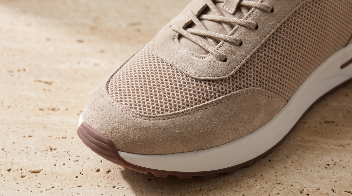 Close-up of the Beige Cove Trainer's suede and mesh upper