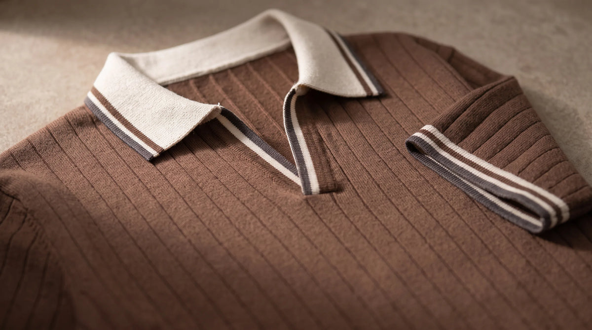 Close-up of the Bonassola Knit Polo's cream tipped open collar