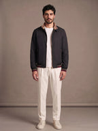 Camogli Black Casual Jacket worn with ivory trousers