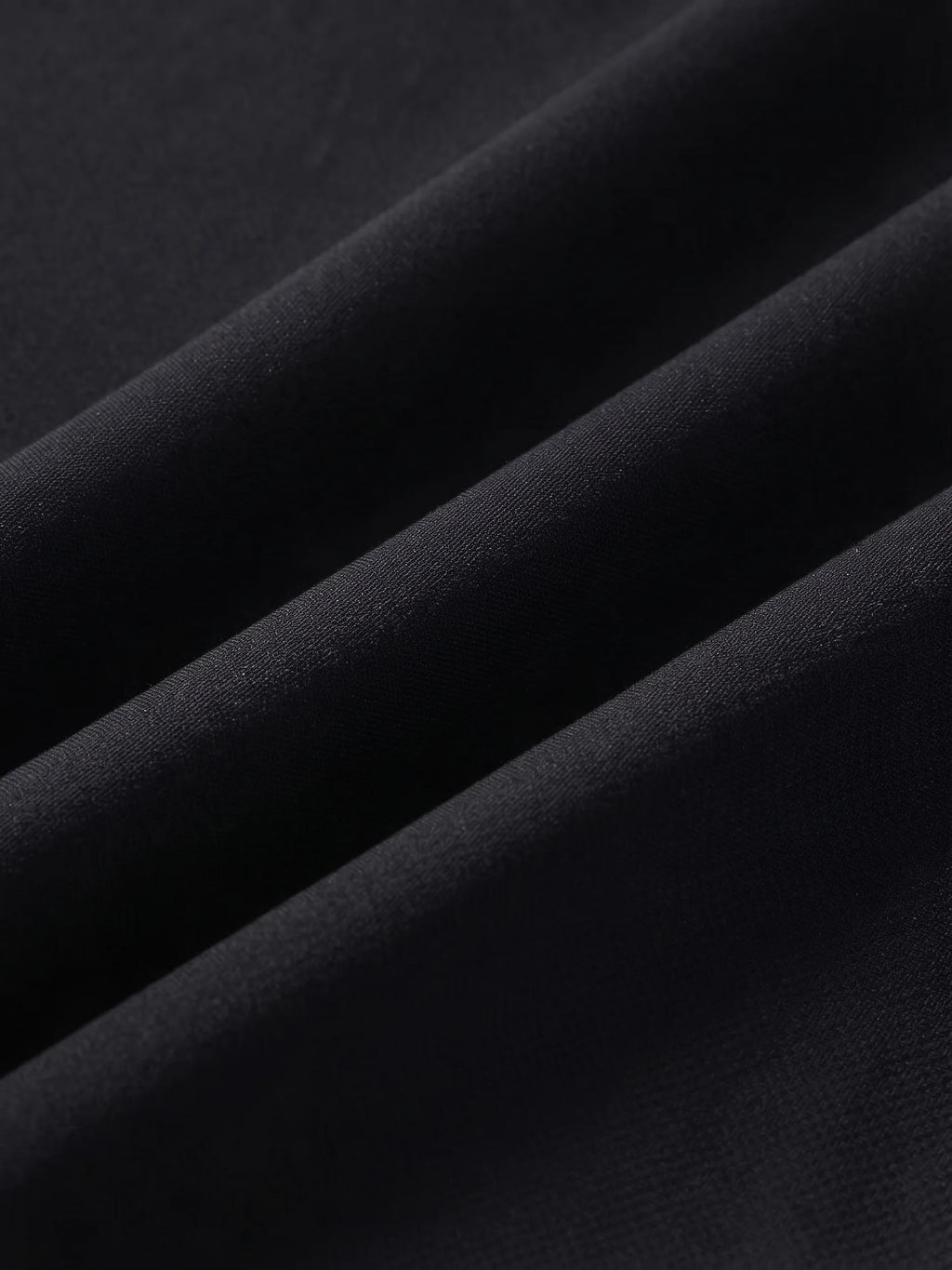 Close detail of the black woven shell