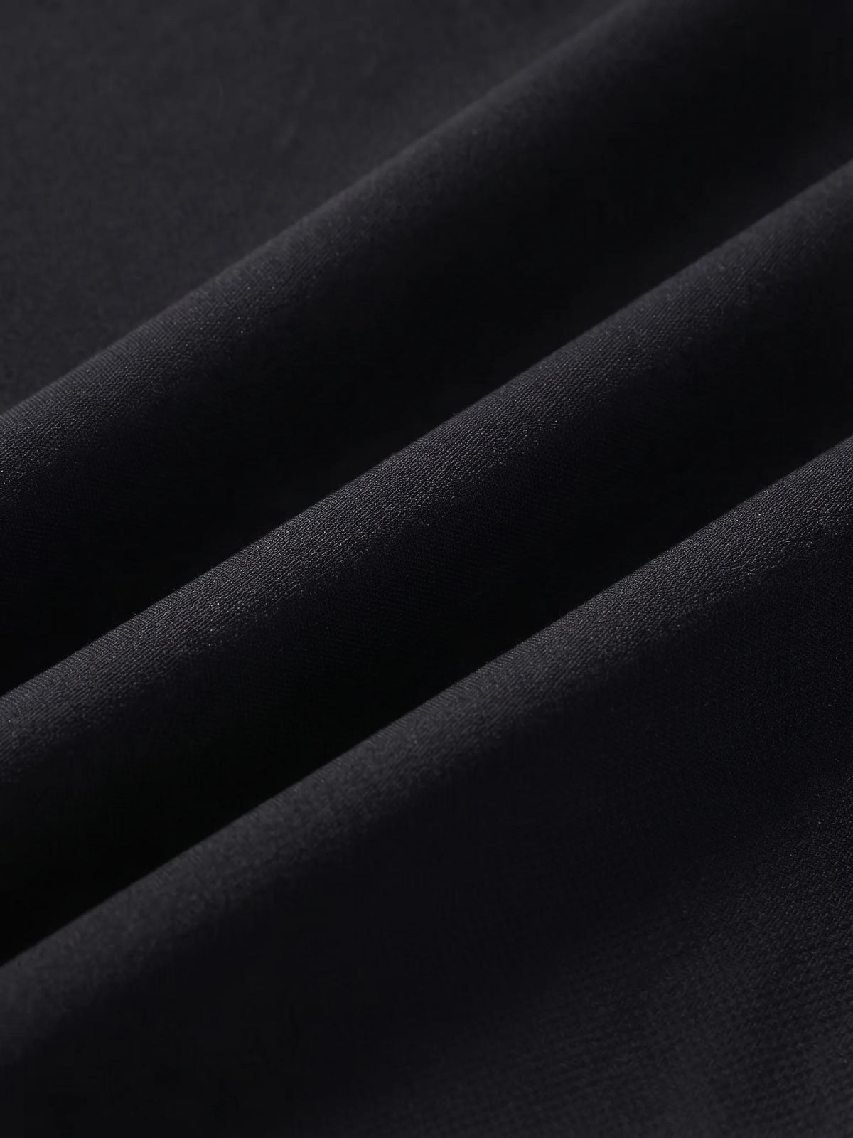Close detail of the black woven shell