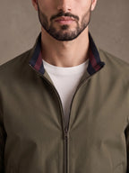 Close-up of the stand collar and brass zip