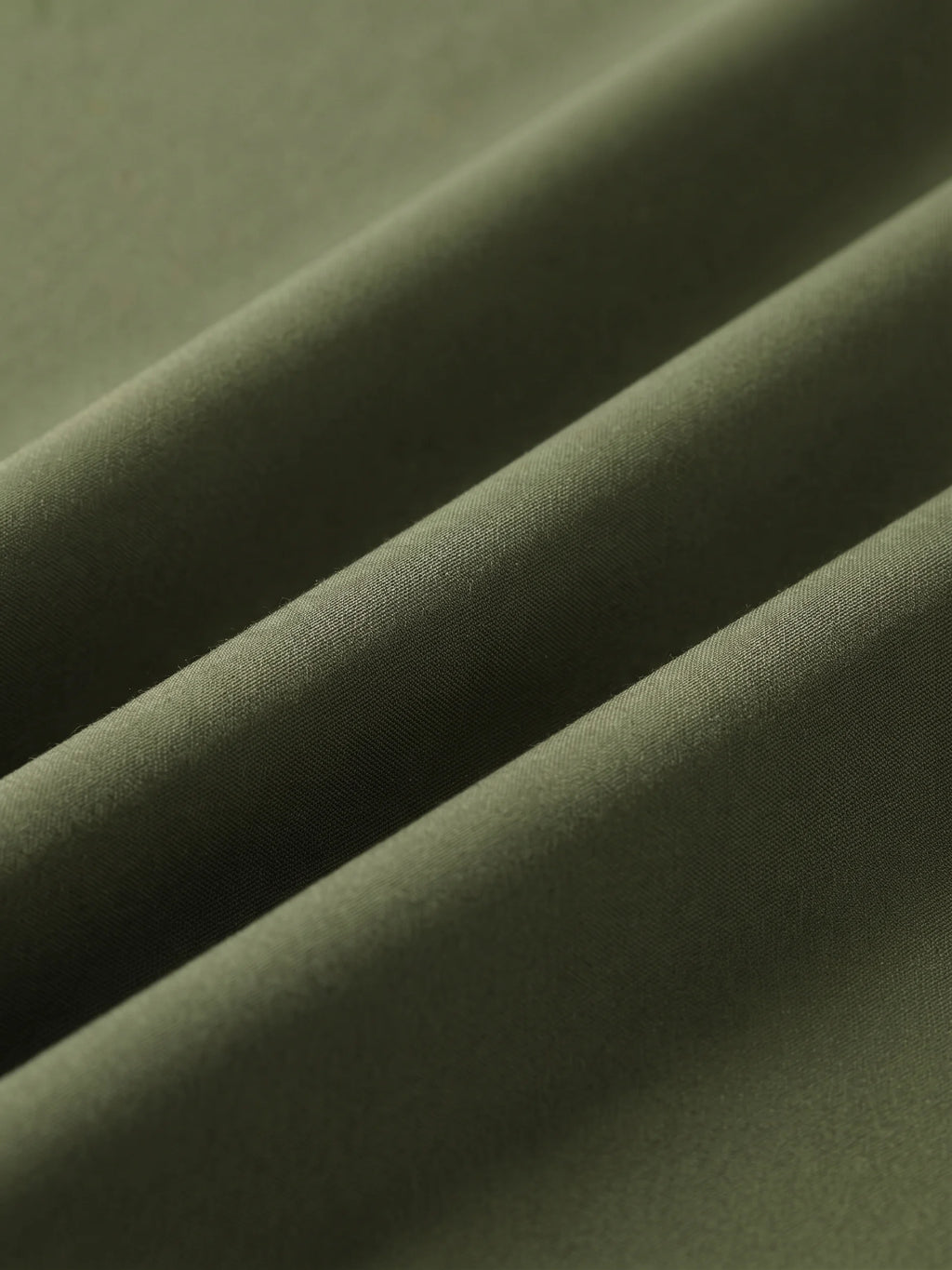 Close detail of the olive woven shell
