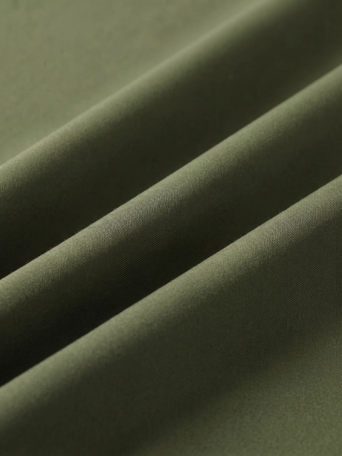 Close detail of the olive woven shell