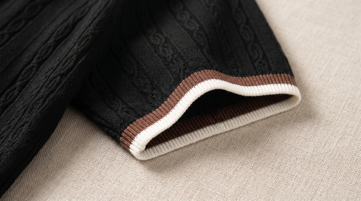 Close-up of the Chiavari Knit Polo's tipped cuff and fine cable texture