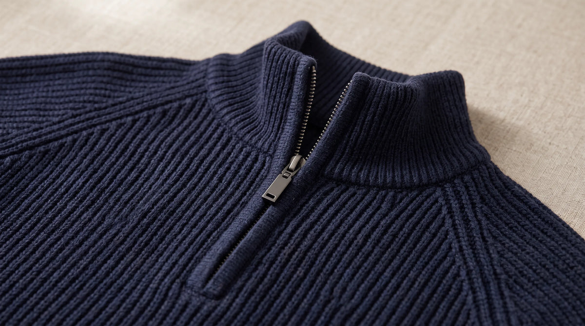 Close-up of the Como Navy Half-Zip Knit's ribbed collar and half zip