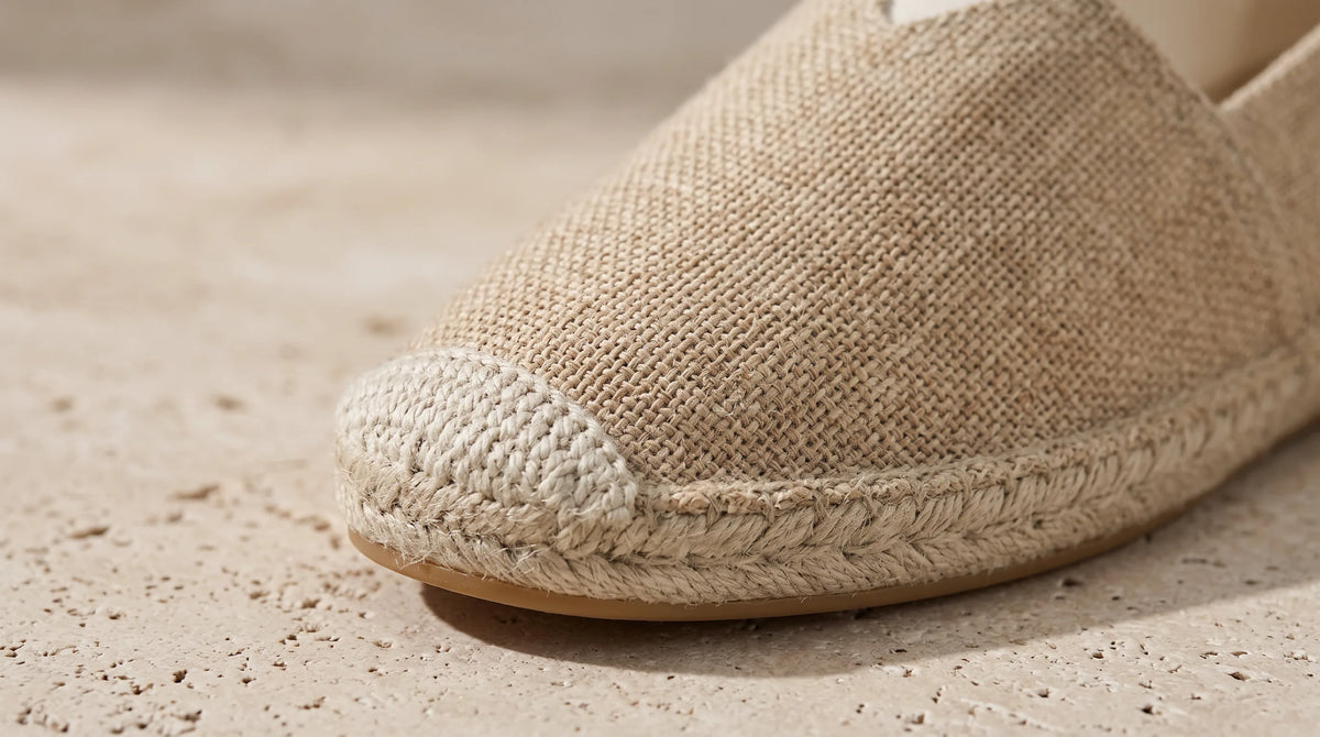 Close-up of the Dark Brown Levanto Espadrille's contrast toe and canvas weave