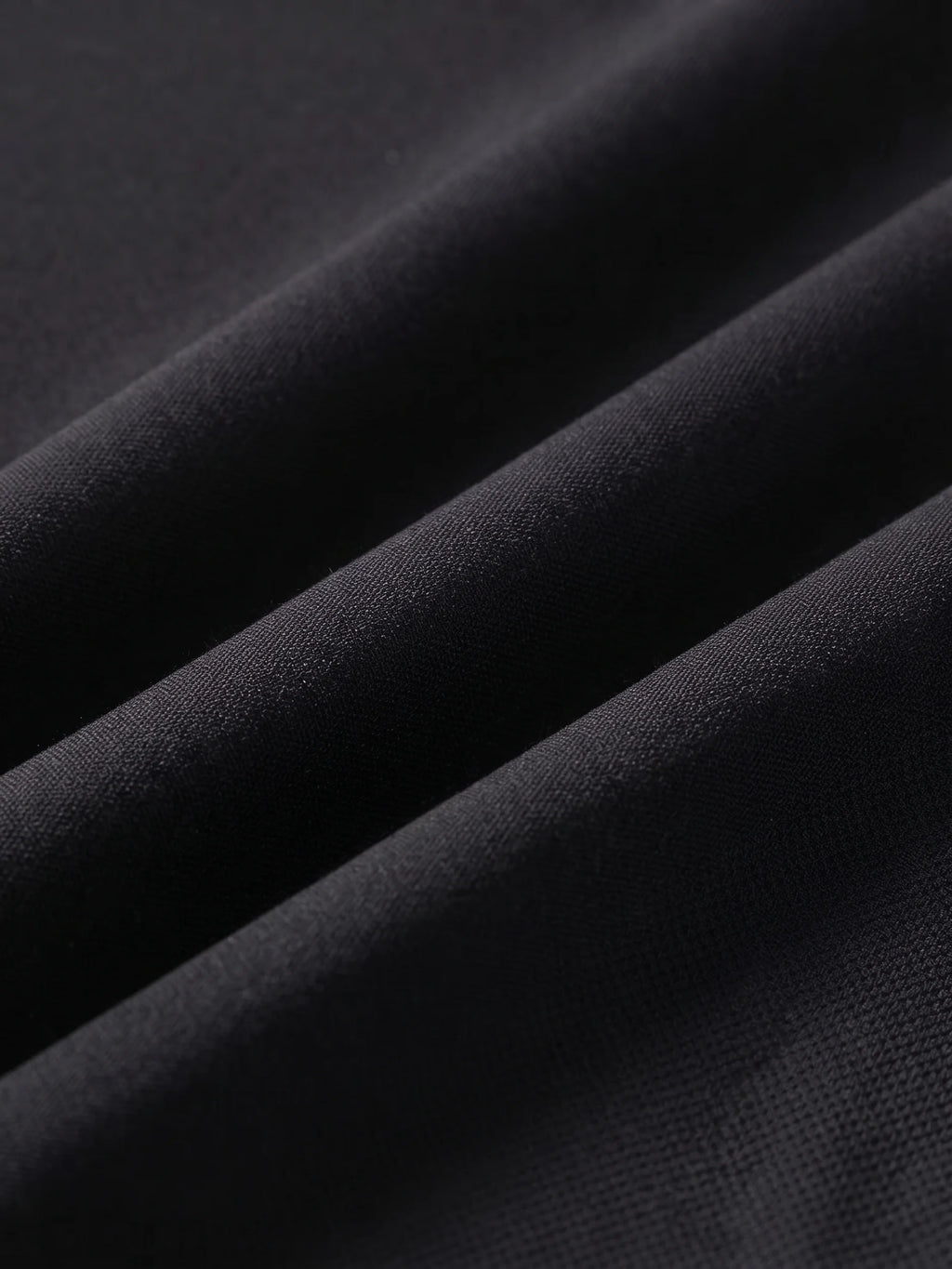 Close detail of the black woven shell