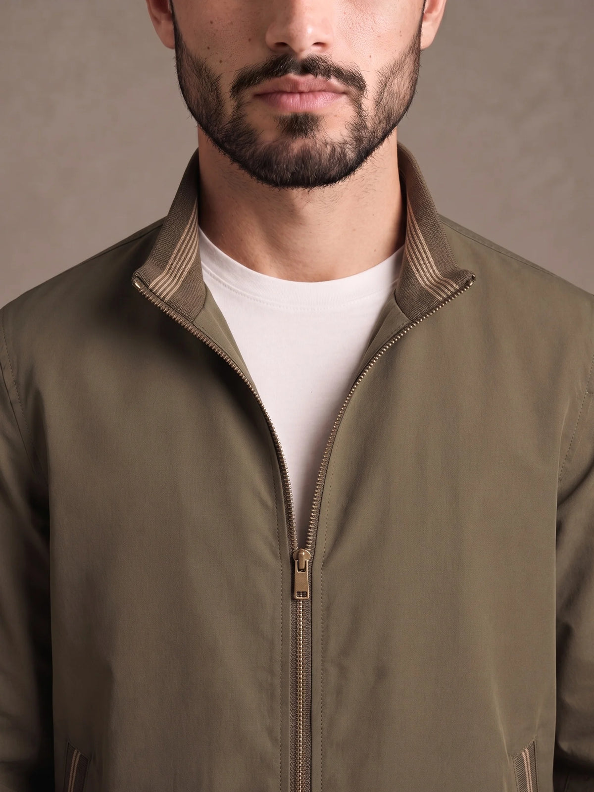 Close-up of the stand collar and brass zip