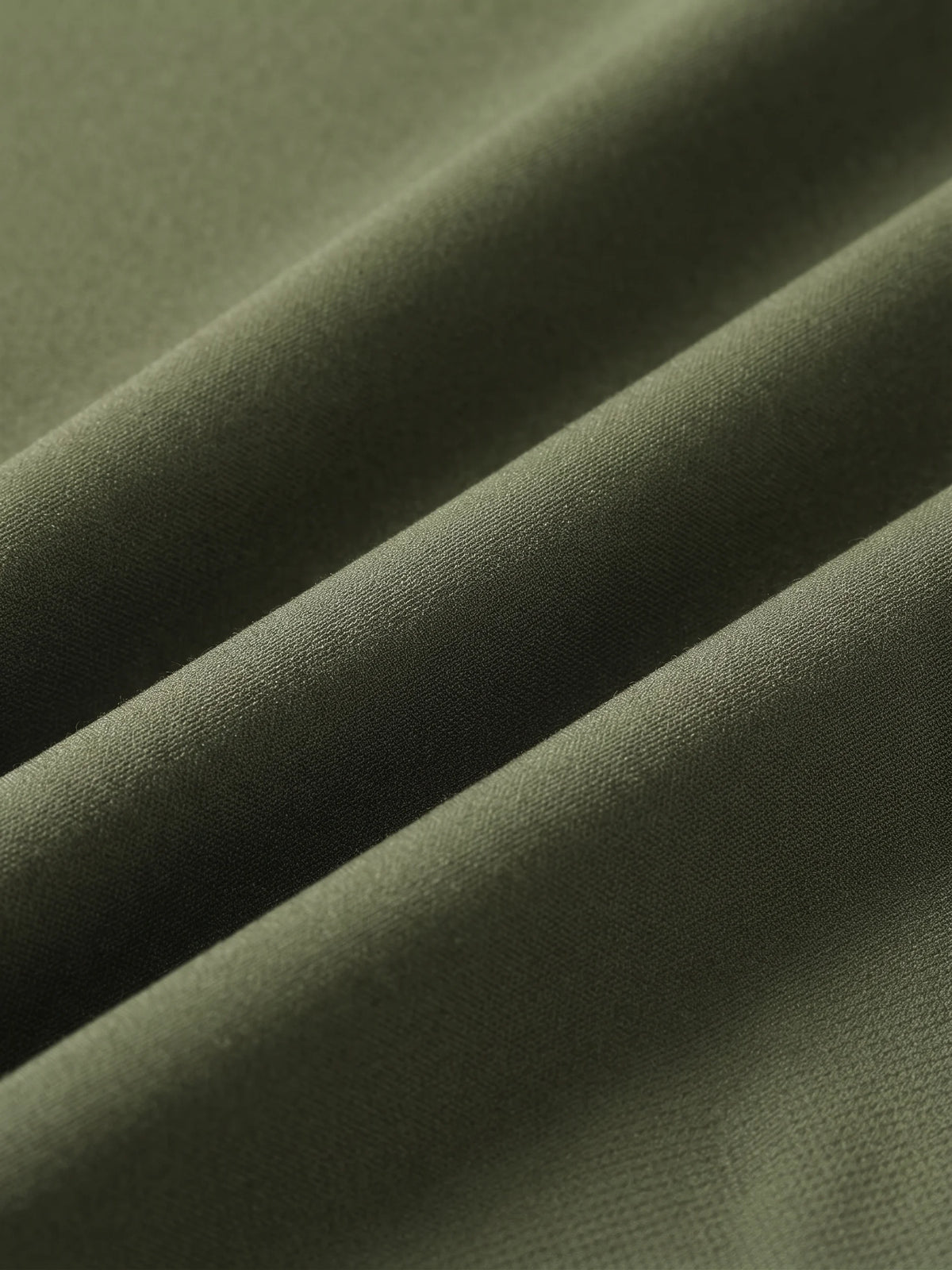 Close detail of the olive woven shell