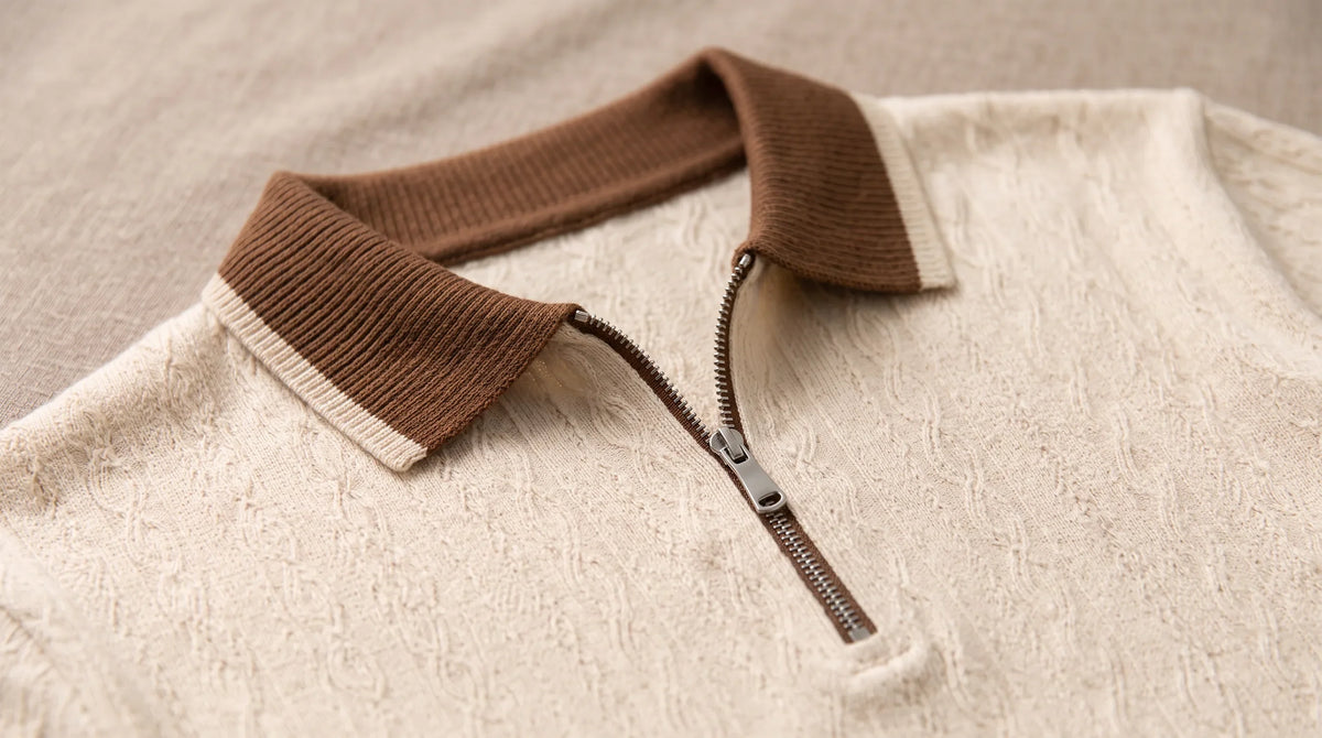 Close-up of the Maiori Knit Polo's contrast collar and zip placket