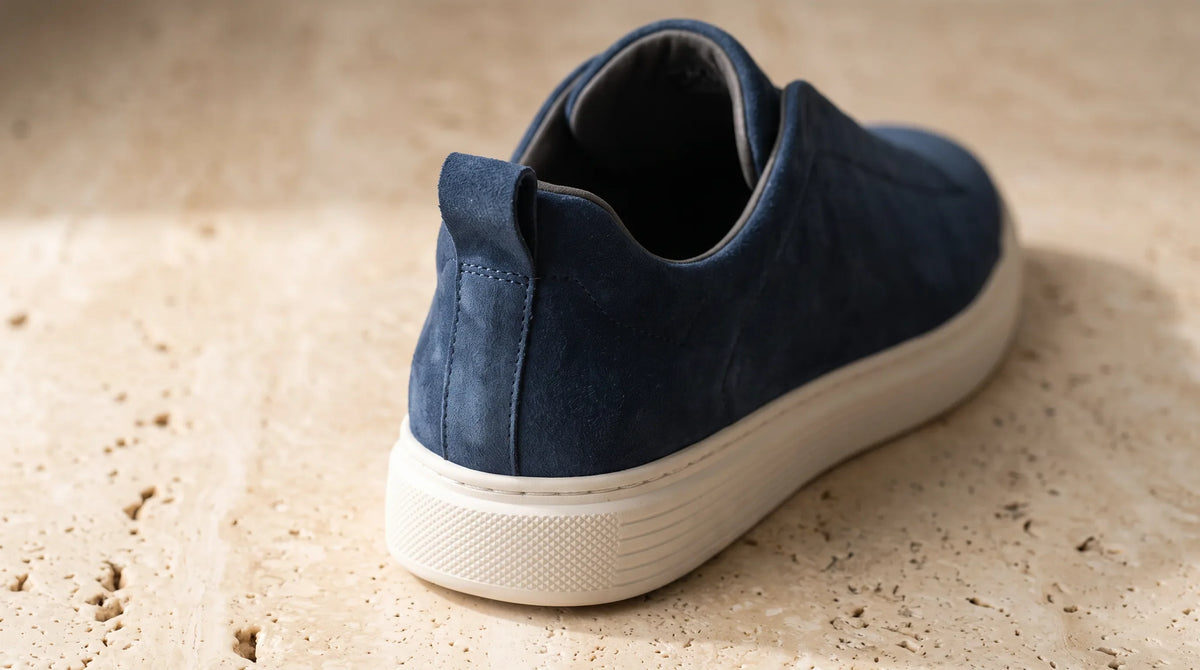 Close-up of the Milano Blue Sneakers' heel and white sole