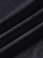 Close detail of the black bamboo-fibre piqué