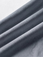 Close detail of the charcoal grey bamboo-fibre piqué