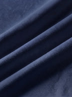 Close detail of the navy bamboo-fibre piqué
