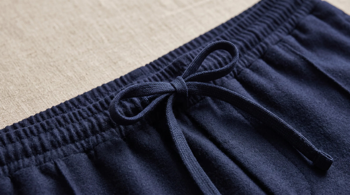 Close-up of the Navy Blue Drawstring Yacht Trousers' drawstring waistband