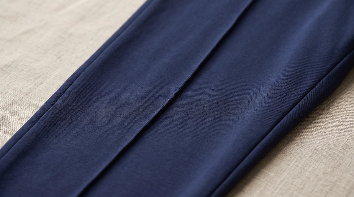Close-up of the Navy Blue Drawstring Yacht Trousers' pressed leg line