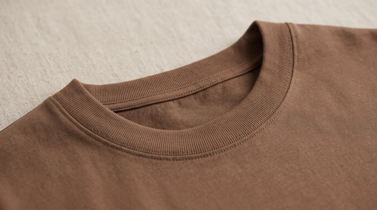 Close-up of the Positano Mocha Tee's ribbed crew neck