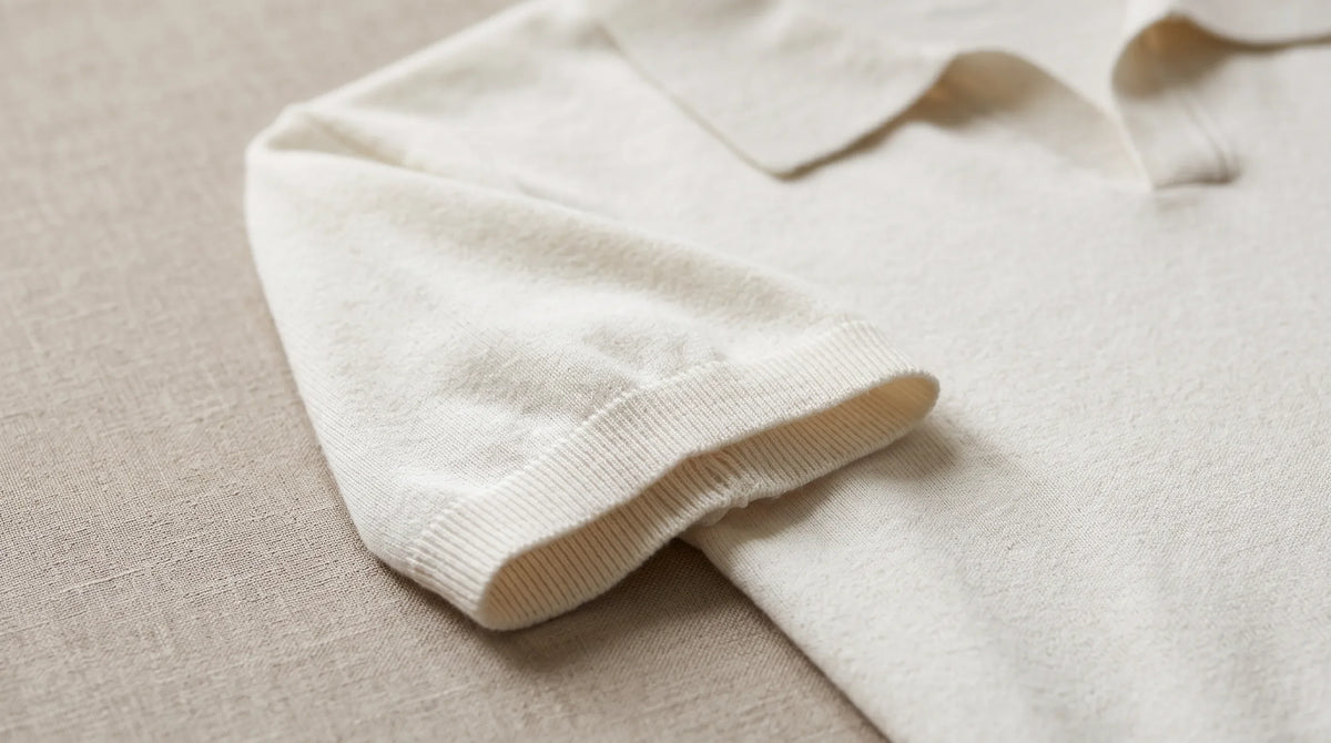 Close-up of the Rapallo Knit Polo's ribbed cuff and fine knit