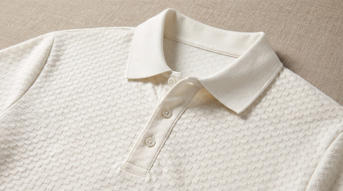 Close-up of the Saint-Tropez Port Polo's spread collar and button placket