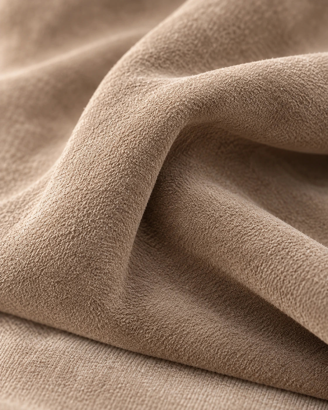 Suede-like fabric in warm beige, softly folded