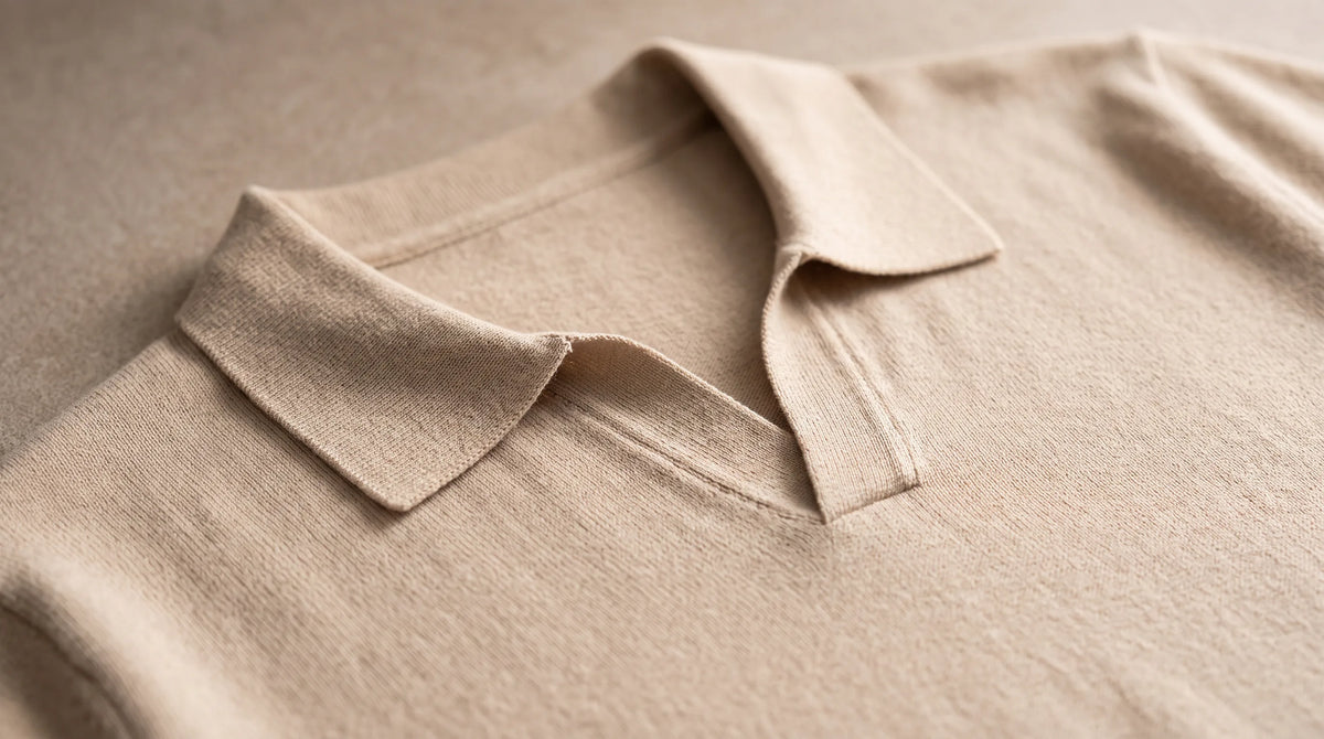 Close-up of the Sorrento Knit Polo's open notch collar