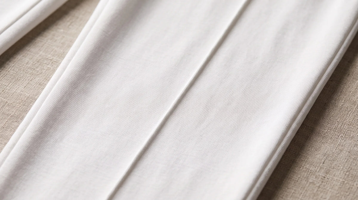 Close-up of the White Drawstring Yacht Trousers' pressed leg line